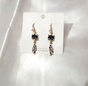 Long Party Wear Designer Earrings Blue Colour Stone