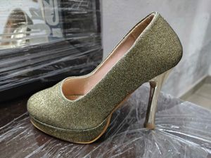 golden sparkling pencil heels