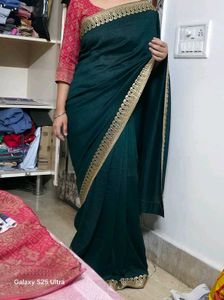 Elegant Green Saree with Gold Border