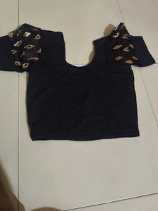 Elegant Blouse with Embellished Sleeves