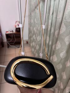 Chic Black Clutch with Gold Accent