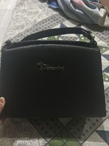 Chic Black Shoulder Bag with Chain Detail