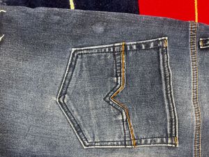 Distressed Blue Denim Jeans