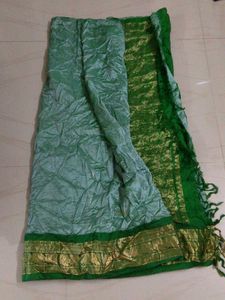 Elegant Green Saree with Gold Border