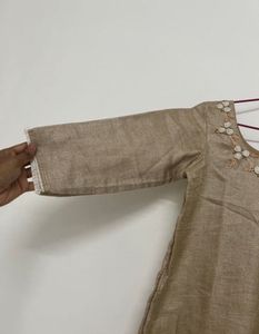 Elegant Beige Kurta with Floral Neckline