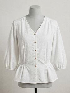 Elegant White Embroidered Peplum Top