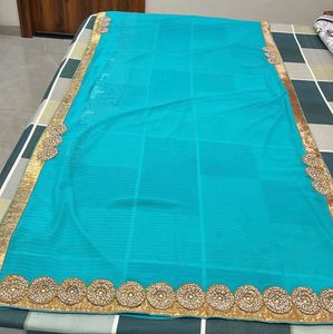 Beautiful Teal Blue Saree with Gold Border