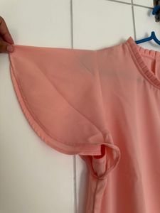 Chic Peach Ruffled Neck Top
