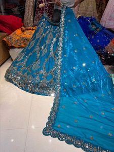 Stunning Teal Lehenga Choli with Mirror Work