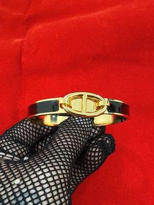 Elegant Gold &amp; Black Bangle Bracelet