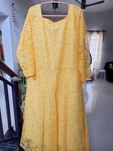 Yellow Lace Gown with sweet heart neck pattern