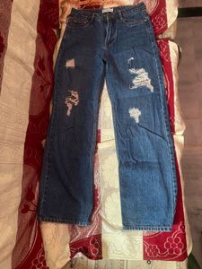 Distressed Blue Denim Jeans