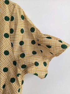 Green polka dot yellow dress