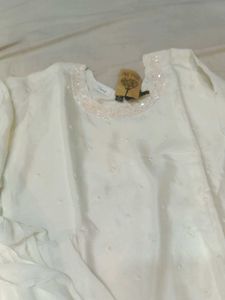Elegant White Kurta Set with Flared Sleeves