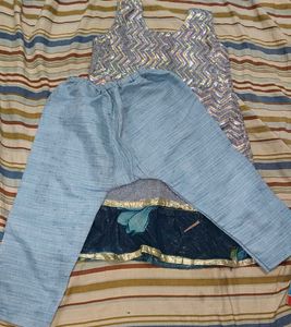 Sparkling frock with comfortable trouser .