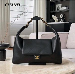 Chanel Maxi CC Hobo crafted in supple calfskin wit