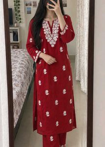 Maroon elegance paired with delicate Chikankari