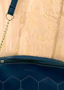 Beautiful blue sling bag with gold chain