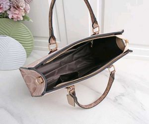 COACH**12A QUALITY HANDBAG* AT OFFER PRICE