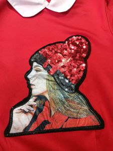 Chic Red Top with Sequin Embellishment