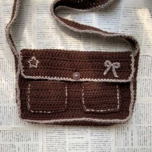 Crocheted Black Shoulder Bag with Bows