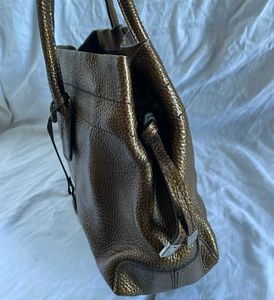 Tod's (Authentic)Camel Leather.