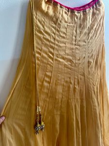 Fishcut Golden Lehenga with hot Pink Blouse