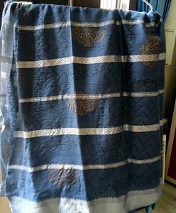 Elegant Blue Saree with Intricate Patterns