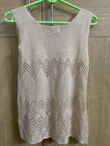 Elegant Sleeveless Knit Top with Cutout Design