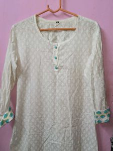 Elegant White Kurta with Teal Accents