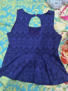 Blue Peplum Top with Cutout Detail
