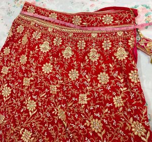 Rani pink Embroidered Lehenga Choli