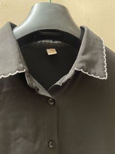 Black statement shirt with white detailing