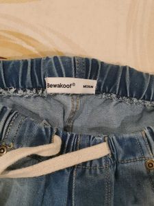 Distressed Denim Jogger Jeans