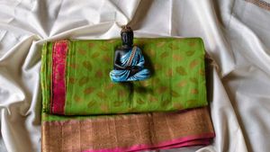 Vibrant Green Saree with Pink Border