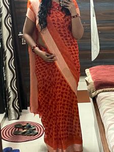 Elegant Orange Heart Print Saree