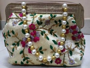 Embroidered Clutch with Pearl Handle