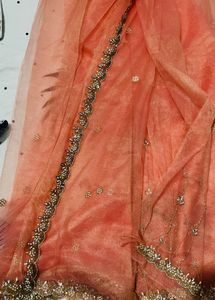 Sequins and hand stiched Net Saree with blouse pie