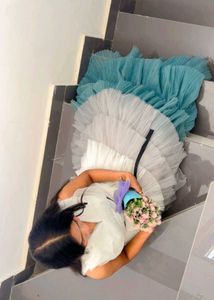 Tiered Ruffle Gown with Floral Accent