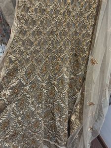 Elegant Embroidered Ethnic Gown with bead stones
