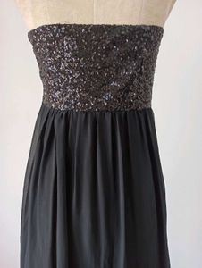 Sparkly Strapless Black Dress. small holes