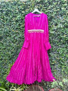 A Fuschia Colour Jumpsuit.