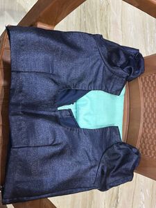 Elegant Teal Saree with Intricate Border