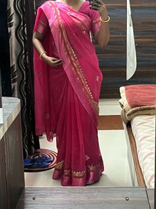 Elegant Pink Saree with Golden Detailing