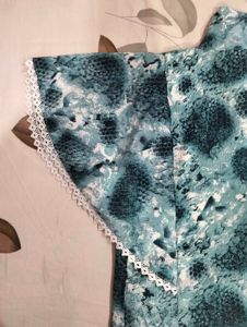 Stylish Blue Printed Top with Lace Detail