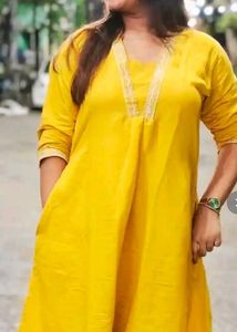 it's a XL size Yellow Kurta with Lace Detail