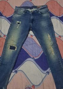 Men's Distressed Blue Jeans