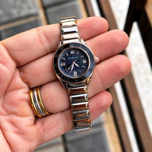 Elegant Gold Tone Swarovski Watch