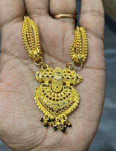 Elegant Gold mangal sutra with Black Beads