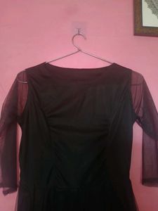 Elegant Black Dress with Sheer Sleeves